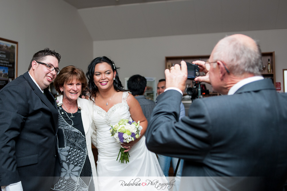 kat-todd-soljans-vineyard-auckland-cheap-candid-wedding-photographer-raduban-photography
